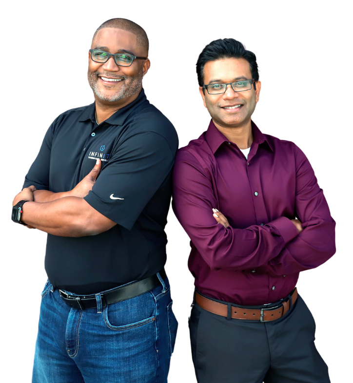 Infinity Tech Consulting technology professionals standing confidently with arms crossed wearing branded polo and business attire in studio setting
